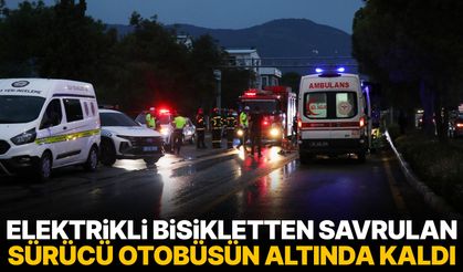 Elektrikli bisikletten savrulan sürücü otobüsün altında kaldı