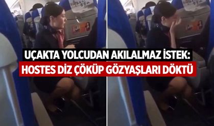 Yolcunun isteğini duyan hostes diz çöküp gözyaşlarına boğuldu