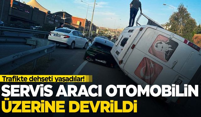 Seyir halindeyken üzerlerine servis aracı devrildi