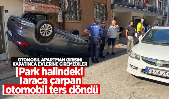 Park halindeki araca çarpan otomobil ters döndü: 1 yaralı