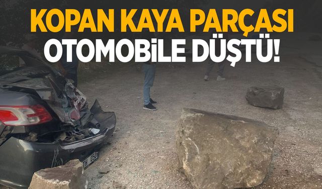 Kopan kaya parçası otomobile düştü