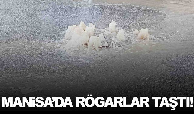 Manisa’da yağmur etkili oldu… Rögarlar taştı!