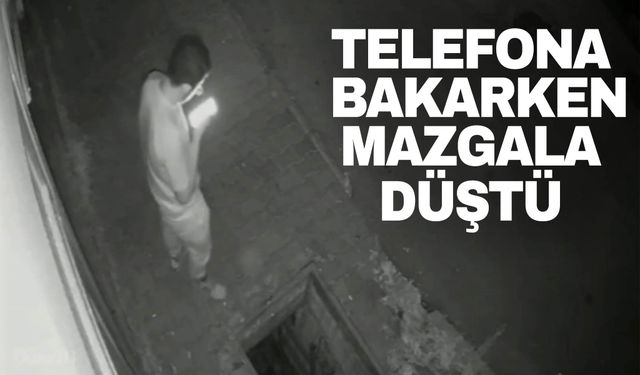 Bursa'da telefona bakarken mazgala düştü