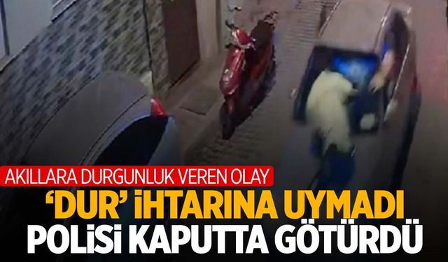 İzmir’de sürücü ‘dur’ ihtarına uymadığı gibi polisi de 300 metre kaputta götürdü!