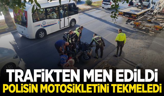 Trafikten men edildi… Polisin motosikletini teklemedi