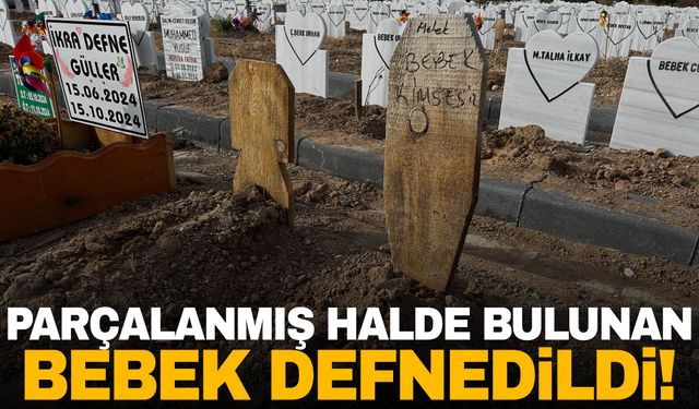 Boş arazide parçalanmış halde bulunan bebek defnedildi