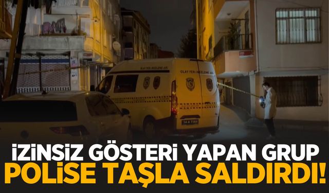 Çöp konteyneri ile yolu kapattılar… Polise taşla saldırdılar!