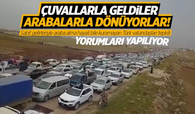 Suriyeliler otomobilleriyle uzun araç kuyrukları oluşturdu