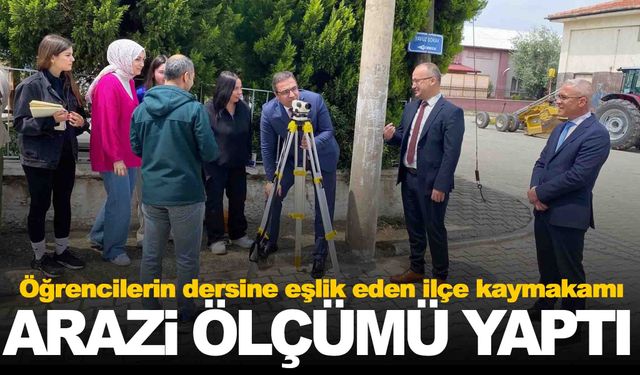 Kaymakam öğrencilerle birlikte arazide ölçümü yaptı