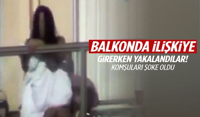 Komşularına aldırış etmeden balkonda ilişkiye girdiler!