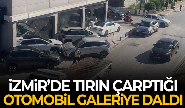 İzmir’de tırın çarptığı otomobil galeriye daldı