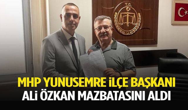 MHP Yunusemre İlçe Başkanı Ali Özkan mazbatasını aldı