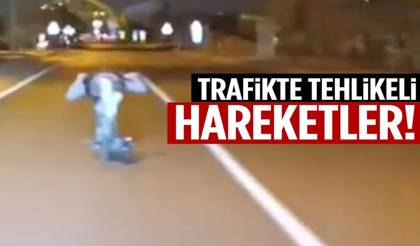 Trafikte tehlikeli hareketler! Motosikleti yatarak kullandı