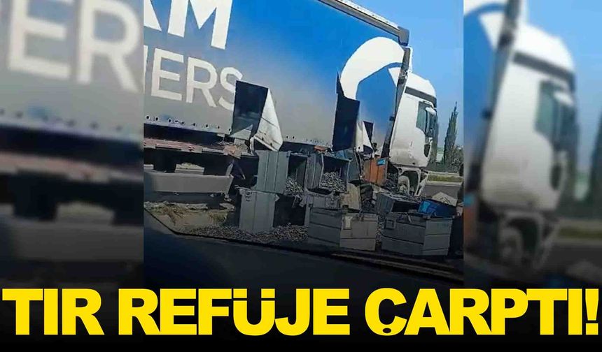 Manisa’da tır refüje çarptı... Tırdaki yük yola saçıldı