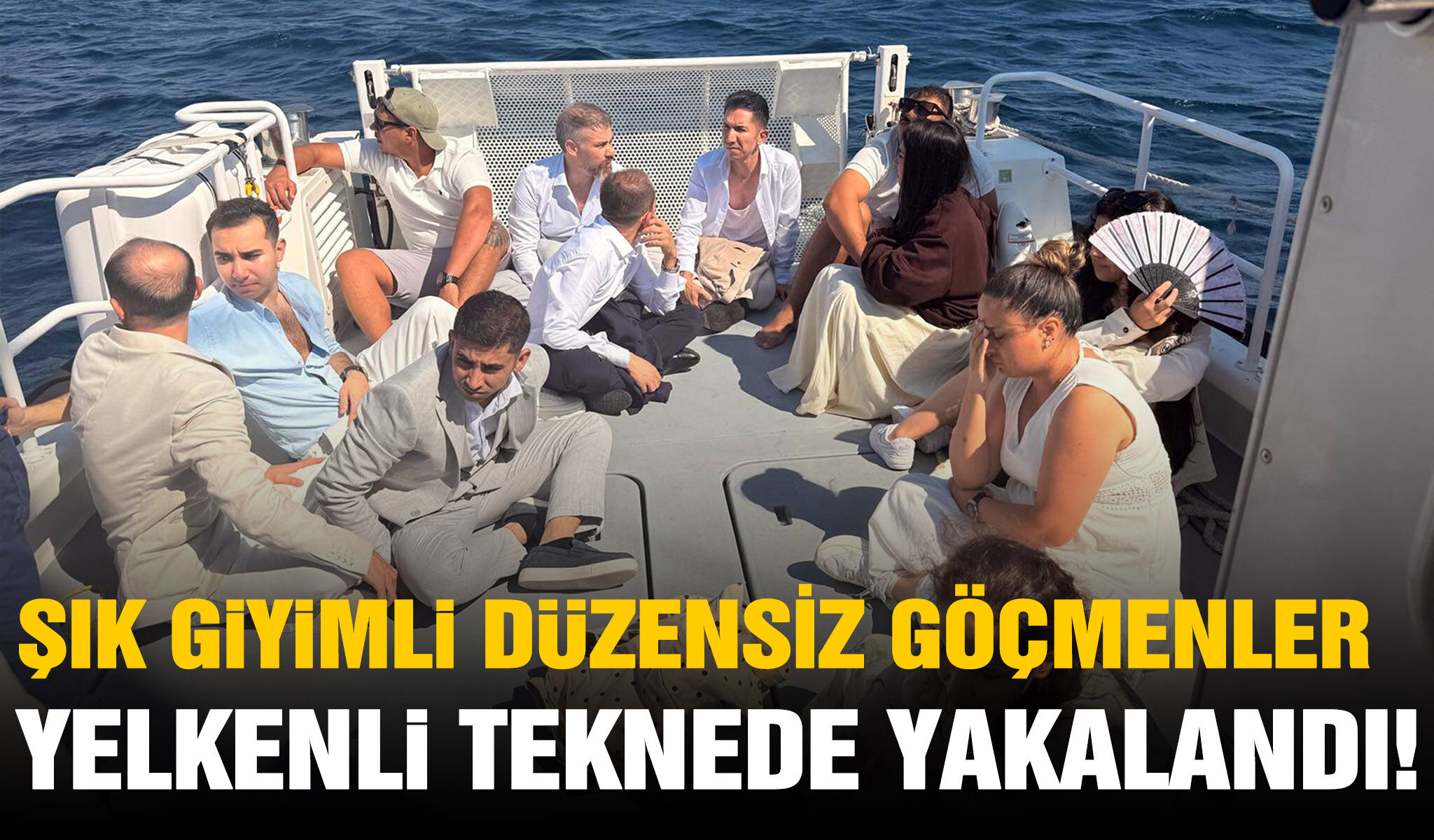 Şık giyimli düzensiz göçmenler yelkenli teknede yakalandı
